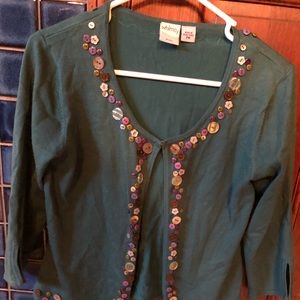 Cute “whimsey” sweater with button accents